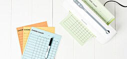Cards being laminated using a Scotch™ Brand Laminating Product.
