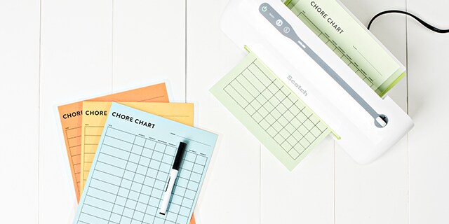 Cards being laminated.
