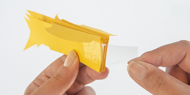 Stick the two cutouts together with Scotch® Double-Sided Tape.
