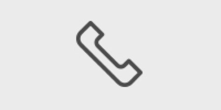Icône de téléphone gris foncé.
