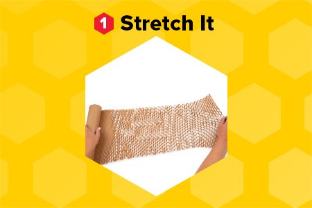 ”Stretch it” hands stretching Scotch™ Cushion Lock™ Expanding Paper Wrap on a honeycomb patterned yellow background.
