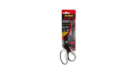Une paire de Ciseaux de précision en titane antiadhésifs ScotchMC Ultra dans son emballage.
