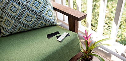 Hacks for Outside, use scotch products on your exterior furniture cushions to keep them in place.